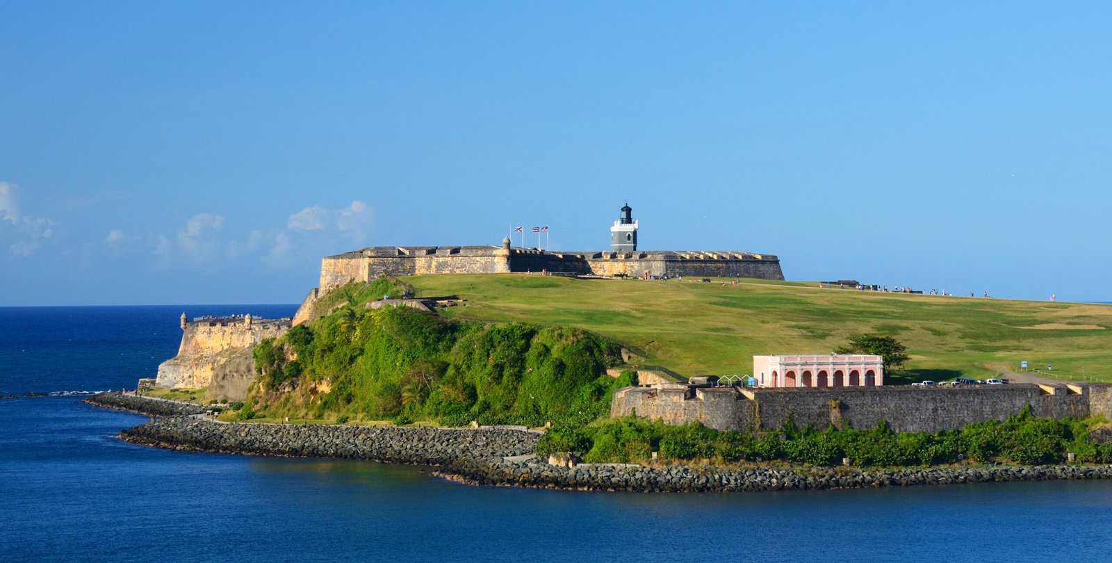 Castillo San Felipe del Morro, the historic stone fortress on a green headland above blue water in San Juan, Puerto Rico, one of our ports of call.